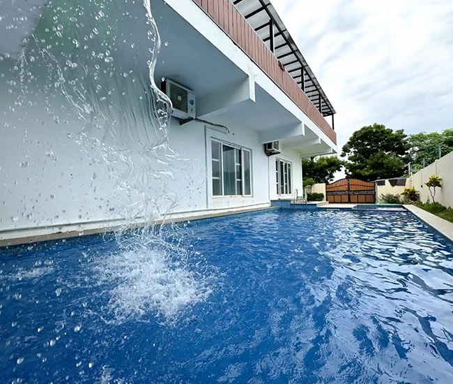 Beach facing private pool villa at Emirates with sea views and relaxation space in ECR Chennai
