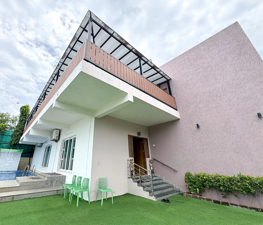 Exterior of Emirates Villa with beach access and pool in ECR Chennai near Kovalam beach.