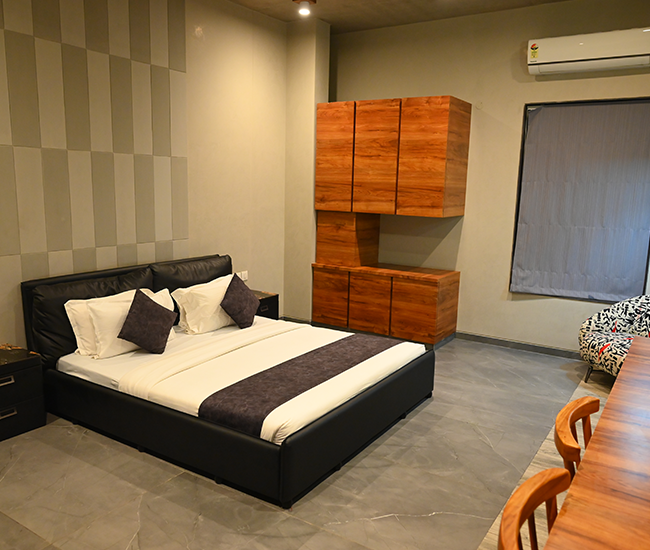 Air-conditioned luxury bedroom in private beach villa at Kovalam, ECR Chennai.
