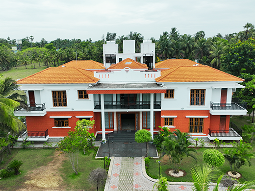 Aerial view of Amrith Palace in ECR Chennai showcases expansive beachside property and private luxury stay