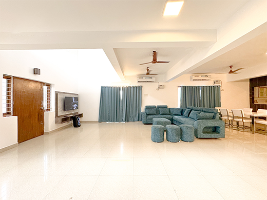 Spacious living room at Emirates Beach House in ECR creates a comfortable private stay for families