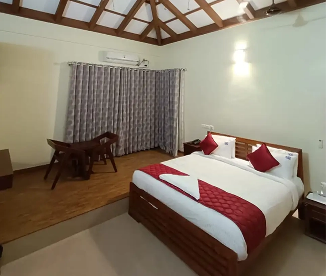 Spacious luxury bedroom at Amrith Palace villa on ECR Chennai designed for comfort and privacy.