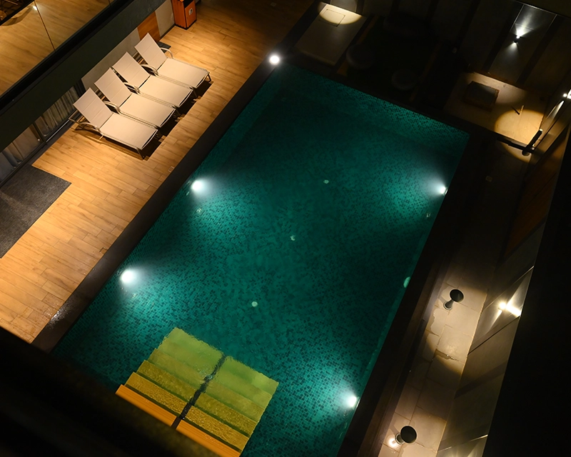 Aerial view of luxury beach villa with private swimming pool in Kovalam, ECR Chennai.