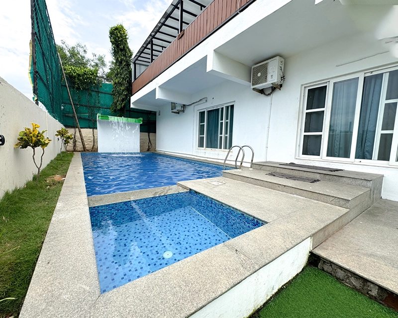 Front view of Emirates Beach Villa luxury private pool villa in ECR Chennai near Kovalam beach.