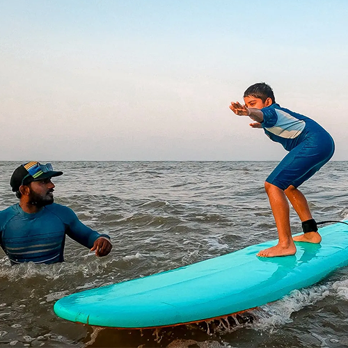 Professional surf school offering surfing lessons and rentals at Kovalam ECR Chennai.